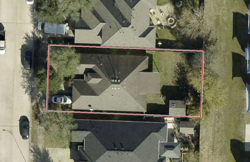 Aerial photo of 13919 Early Dew Ct, lot outlined in red
