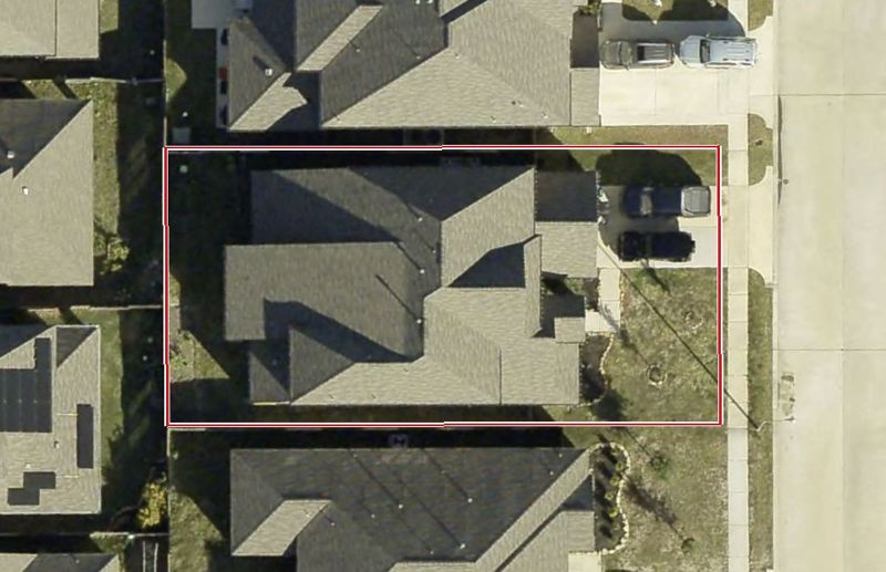 Aerial photo of 4519 Hronas Dr, lot outlined in red