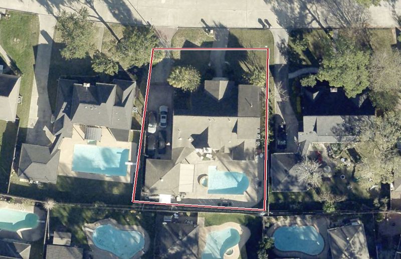 Aerial photo of 11515 Parkriver Dr, lot outlined in red