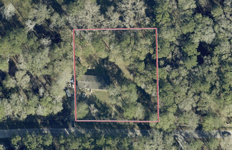 Aerial photo of 2857 Hargraves Rd, lot outlined in red