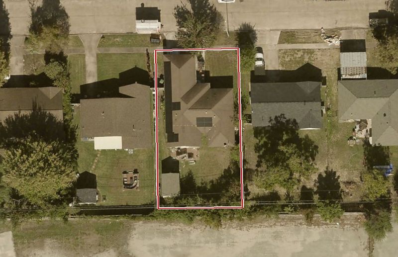 Aerial photo of 9918 Aves St, lot outlined in red