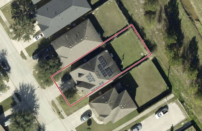 Aerial photo of 23622 Stargazer Point, lot outlined in red
