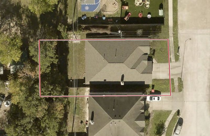 Aerial photo of 18311 June Forest Dr, lot outlined in red