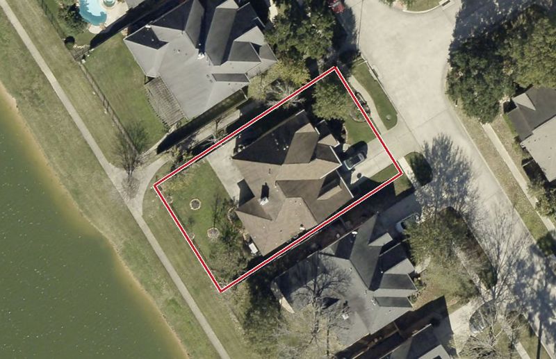 Aerial photo of 19507 Country Village Dr, lot outlined in red
