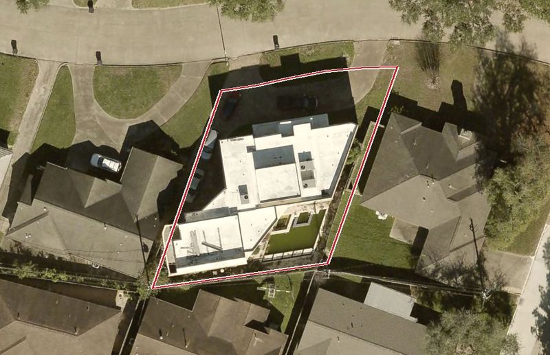 Aerial photo of 3866 Palm St, lot outlined in red