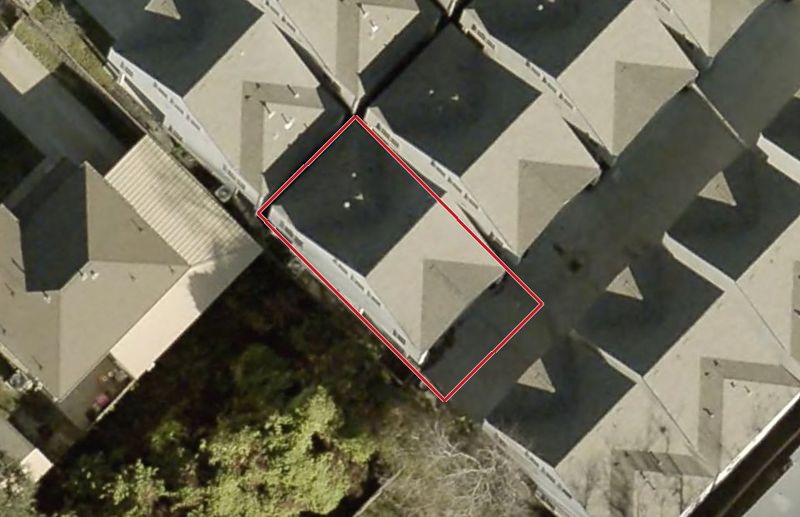 Aerial photo of 6135 W Montgomery Rd, lot outlined in red