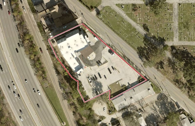 Aerial photo of 3401 N Main St 95, lot outlined in red