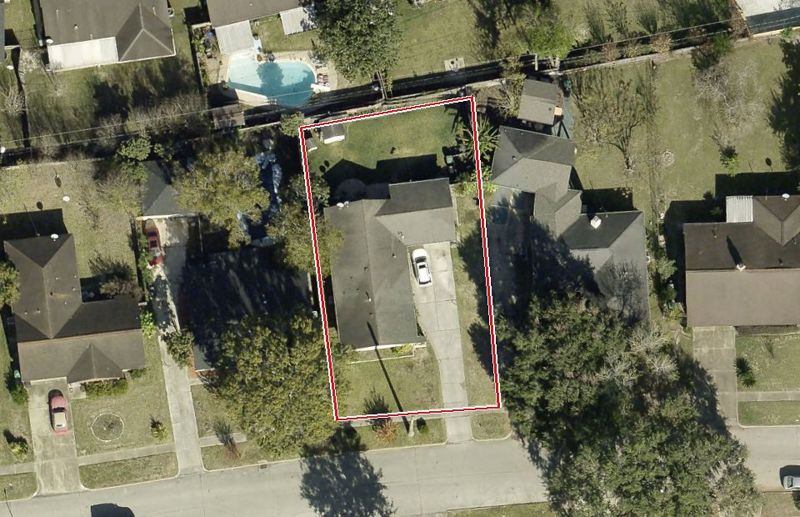 Aerial photo of 6118 Heatherbrook Dr, lot outlined in red