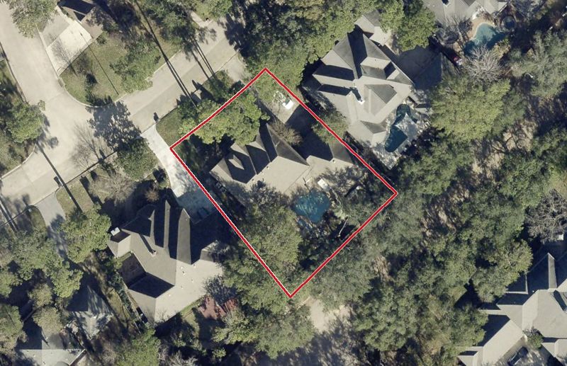 Aerial photo of 7031 Centre Oaks Dr, lot outlined in red
