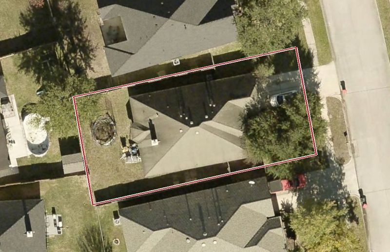 Aerial photo of 14127 Spring Mountain Ln, lot outlined in red