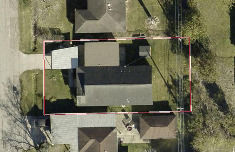 Aerial photo of 10601 Dulcimer St, lot outlined in red