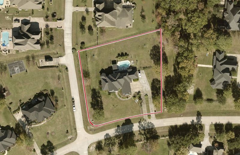 Aerial photo of 12703 Summer Lake Ranch Dr, lot outlined in red
