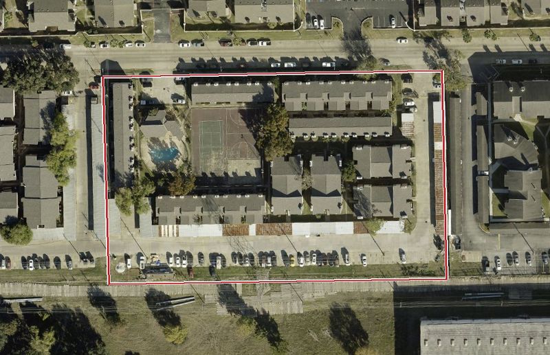 Aerial photo of 10501 South Dr 301, lot outlined in red